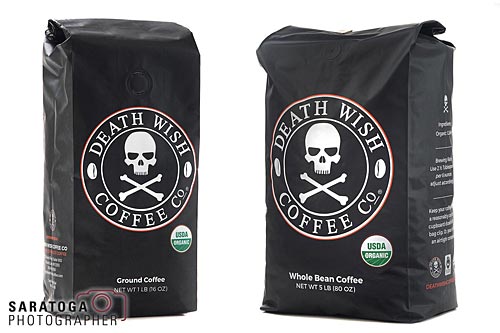 Two packages of death wish coffee on white background