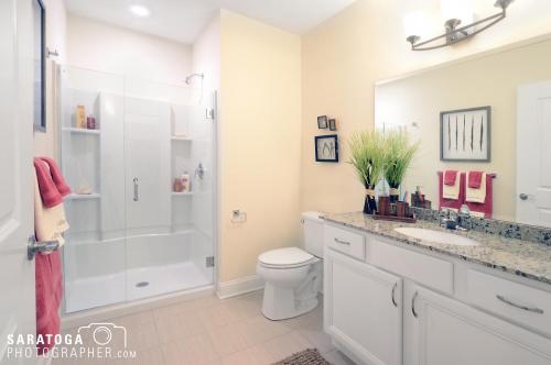 Interior image of bathroom sink and shower area at springwater inn bed and breakfast