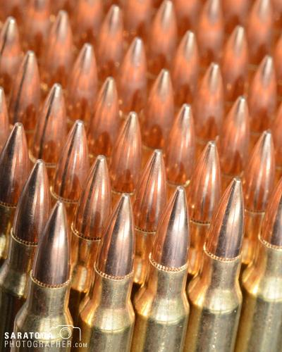 Close up low angle view of Group of 223 high caliber ammunition bullet ends